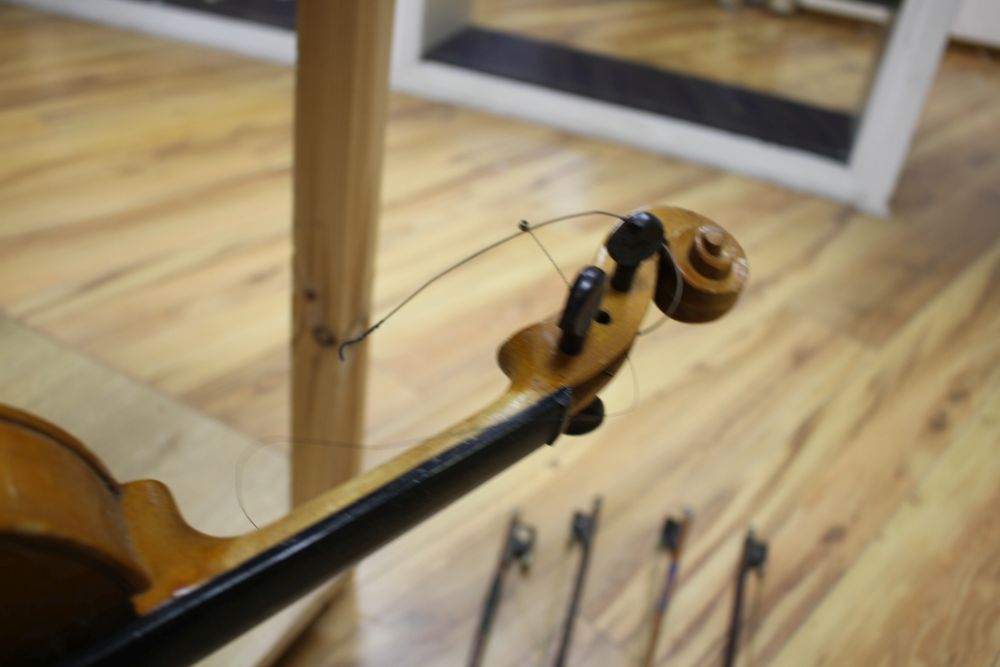 A Chinese violin and four bows